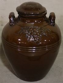 Covered pottery vase