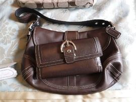 Coach bad.. looks brand new. and a used wallet  priced to sell!