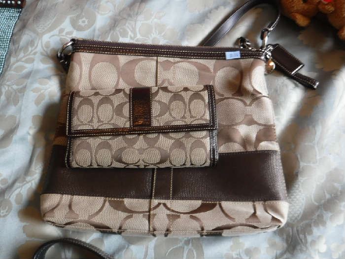 Another Coach set also a with a new bag and a slightly used wallet