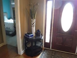 The oval end table in the style of the twin round ones