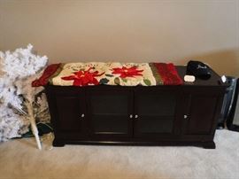Dark wood TV entertainment credenza with a low profile and 2 glass doors. Hard to photograph.
