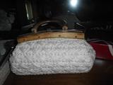 Vintage purses lots of them in very nice condition also raccoon fur coats and vintage leather jackets and mink coats