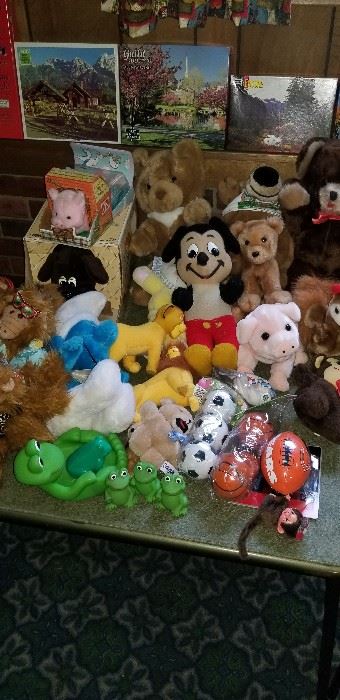 Stuffed animals...Look at that vintage Mickey Mouse!