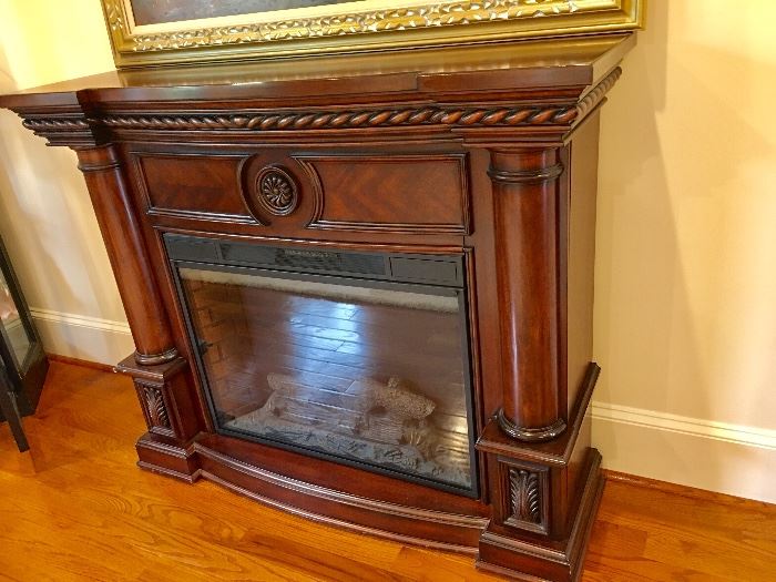 Portable working fireplace and surround.