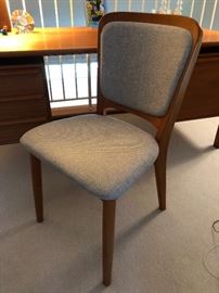 One of two Danish Modern upholstered teak dining/office chairs.  This one is in excellent condition 