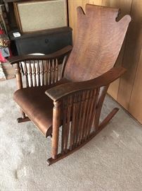 the antique pieces in this sale are very unique, including this solid oak spindle rocker