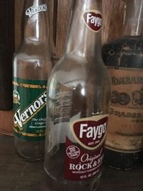 two vintage pop bottles