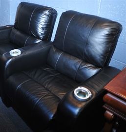 Three Leather Reclining Theatre Chairs.
