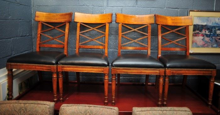 Four Italian Made Chairs with Leather Seats by Baker.