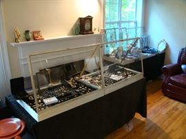 Entire Case on left is Gold 14K, 18K, & 10K                                             
                                                                                                                  
Entire Case on Right Is Sterling Jewelry