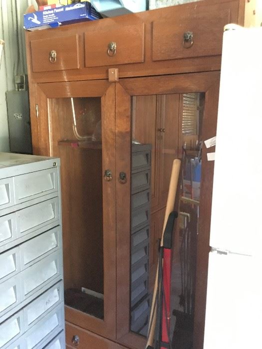 Check the garage first if you are interested in this gun cabinet with drawer on the bottom!