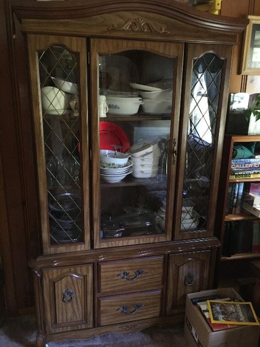 One of two formal china cabinets.