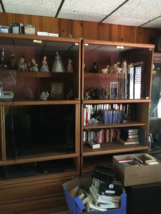 This is a great wall unit with two glass cabinets for displaying your favorite collectibles.
