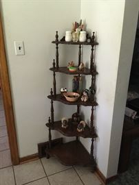 I love this open five-tiered curio -- perfect display for your special pieces and fits neatly into any corner without taking up much room.