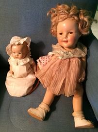 Antique baby doll and antique Shirley Temple doll