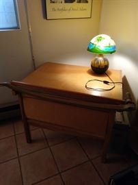 Large paper cutter and lamp.