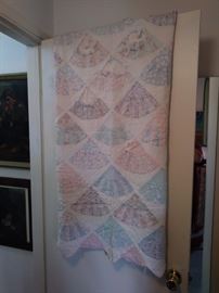 Pink and blue quilt.