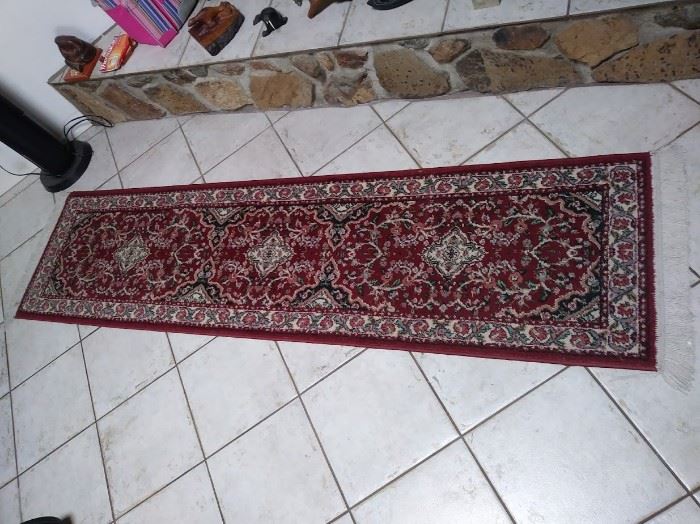 Long red rug.