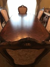 
Michael amini aico original wood dinning table with curio cabinet and 6 chairs. Extra leaf that makes it even bigger. Has been sat on once. Is like new!!