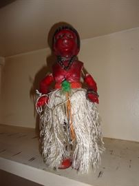 She's an antique hula girl who needs re-stringing and some oil .... then she'll dance for you!