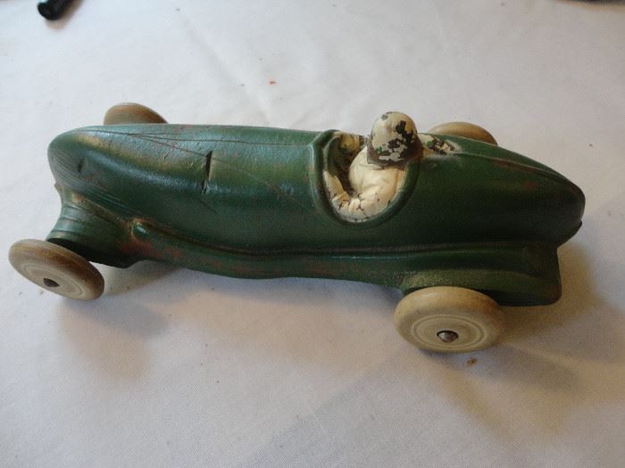 Hard to read the maker's name but here is a vintage rubber racing car