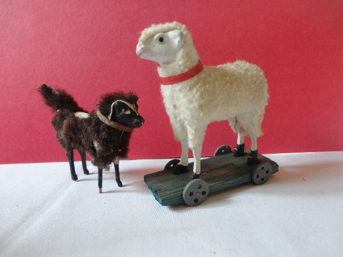 Antique German putz black sheep and antique sheep on wheeled platform