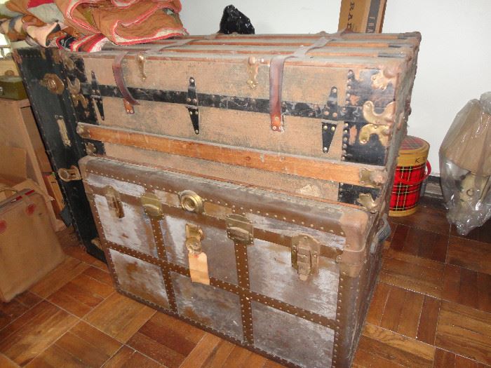 Two of several old trunks - great for a long overseas trip or coffee table conversion!