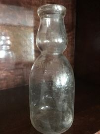 Large collection of antique milk bottles - most seem to be from the New York area.