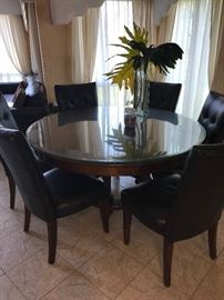 ROUND WOODEN TABLE AND 8 CHAIRS