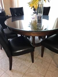 ROUND WOODEN TABLE AND 8 CHAIRS