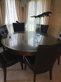 ROUND WOODEN TABLE AND 8 CHAIRS