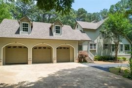 The picture does not do the house justice. 3,400 sq ft home, three car garage plus storage building.