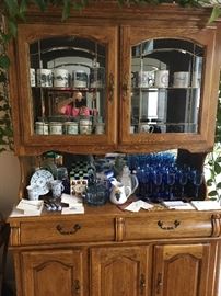 Kitchen/dining hutch. coffee mugs (assorted) blue stem ware, candy dish, hot chocolate set, more.