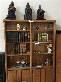 Book case with shelves and cabinet area. Books clock, Assorted glassware, decor etc. Wise Men on top (with their gifts).