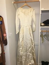 Custom made wedding dress.  Worn  58 years ago this month.  One of a kind!
