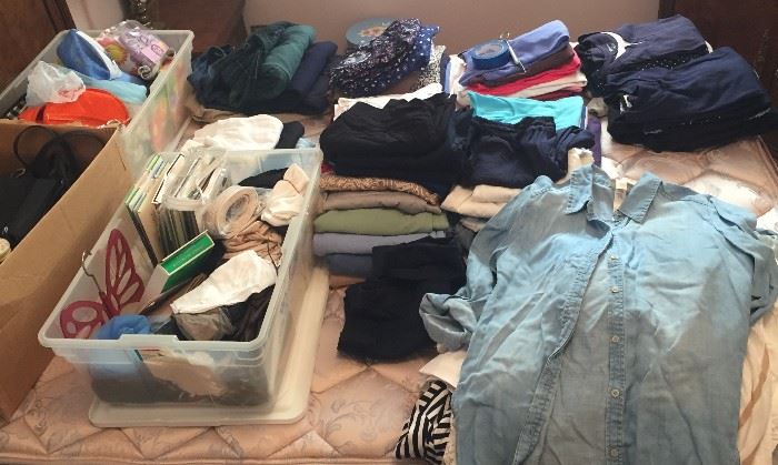 Collection of women's clothing, all in gently used condition, some even still have the tags on them!