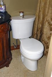 Toilet with Kohler Rose Gold fixture