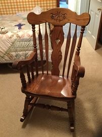 Generous size oak rocking chair