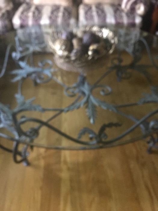Fabulous large ornate  iron base glass top round cocktail table 