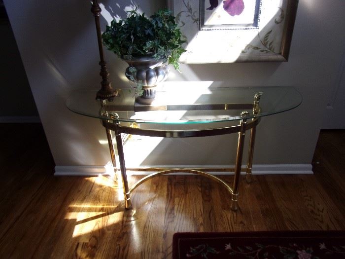 Very pretty semi-circle gold-tone metal and glass table.
