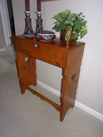 Adorable wood hallway table.