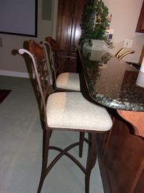 Pub height table and four swivel bar stools(2 are at the bar)