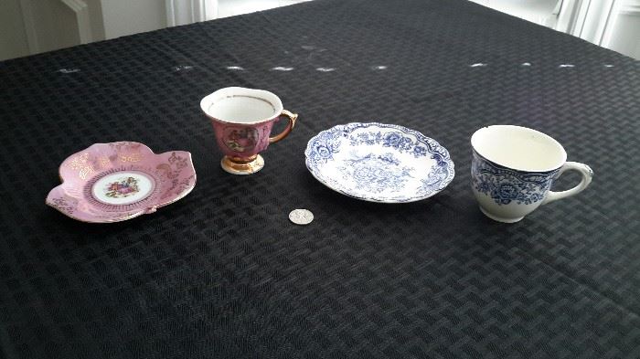Cute little teacups and saucers.