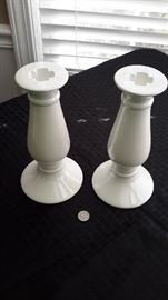 White ceramic candle holders.