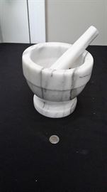 Marble mortar and pestle.