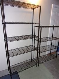 Black metal shelving, one at 73" tall and four at 53" tall.