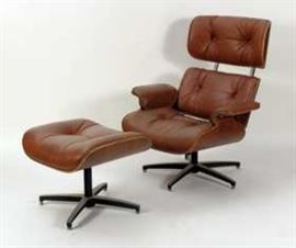 Eames-Style Chair and Ottoman, leatherette upholstery, the metal joint of the chair manufactured by Northfield Metal Products, Waterloo Ontario.
