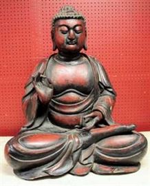 Large Asian Wood & Lacque Buddha, 19th C., is of carved wood covered in lacquer. His hands in the protective gesture. Hands carved
separately and attached with dowels.