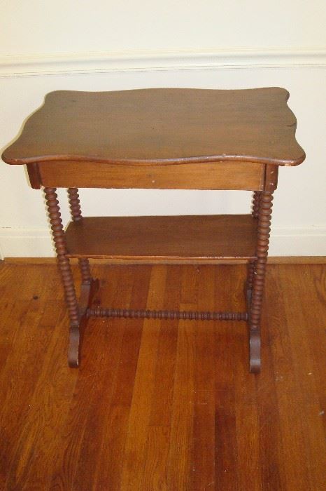 Victorian spool turned leg table.