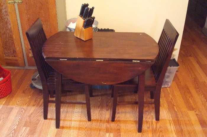 vintage drop leaf table and pair of chairs.
